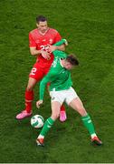 26 March 2024; Evan Ferguson of Republic of Ireland in action against Fabian Schär of Switzerland during the international friendly match between Republic of Ireland and Switzerland at the Aviva Stadium in Dublin. Photo by Michael P Ryan/Sportsfile