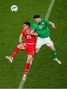 26 March 2024; Vincent Sierro of Switzerland in action against Robbie Brady of Republic of Ireland during the international friendly match between Republic of Ireland and Switzerland at the Aviva Stadium in Dublin. Photo by Michael P Ryan/Sportsfile