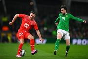 26 March 2024; Fabian Schär of Switzerland in action against Mikey Johnston of Republic of Ireland during the international friendly match between Republic of Ireland and Switzerland at the Aviva Stadium in Dublin. Photo by Tyler Miller/Sportsfile