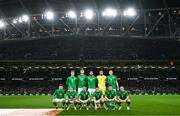 26 March 2024; The Republic of Ireland team, back row, from left, Evan Ferguson, Nathan Collins, Andrew Omobamidele, Gavin Bazunu and Dara O'Shea, with, front, from left, Mikey Johnston, Sammie Szmodics, Robbie Brady, Jason Knight, Seamus Coleman and Josh Cullen before the international friendly match between Republic of Ireland and Switzerland at the Aviva Stadium in Dublin. Photo by Stephen McCarthy/Sportsfile