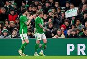 26 March 2024; Robbie Brady, left, and Sammie Szmodics of Republic of Ireland applaud the crowd after they were substituted during the international friendly match between Republic of Ireland and Switzerland at the Aviva Stadium in Dublin. Photo by Stephen McCarthy/Sportsfile