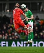 26 March 2024; Callum O'Dowda of Republic of Ireland in action against Kevin Mbabu of Switzerland during the international friendly match between Republic of Ireland and Switzerland at the Aviva Stadium in Dublin. Photo by Ben McShane/Sportsfile