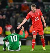 26 March 2024; Becir Omeragic of Switzerland, right, and Adam Idah of Republic of Ireland after the international friendly match between Republic of Ireland and Switzerland at the Aviva Stadium in Dublin. Photo by Ben McShane/Sportsfile