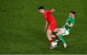 26 March 2024; Zeki Amdouni of Switzerland is tackled by Dara O'Shea of Republic of Ireland during the international friendly match between Republic of Ireland and Switzerland at the Aviva Stadium in Dublin. Photo by Michael P Ryan/Sportsfile
