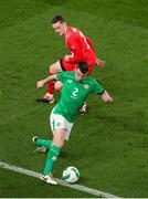 26 March 2024; Seamus Coleman of Republic of Ireland in action against Michel Aebischer of Switzerland during the international friendly match between Republic of Ireland and Switzerland at the Aviva Stadium in Dublin. Photo by Michael P Ryan/Sportsfile