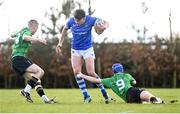 27 March 2024; Patrick Reeves of North Midlands in action against Rian Kavanagh, left, and Nathan Cope of South East during the BearingPoint Shane Horgan Cup Round 5 match between South East and North Midlands at Carlow Institute of Technology in Carlow. Photo by Tyler Miller/Sportsfile