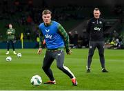 26 March 2024; Republic of Ireland assistant coach Glenn Whelan with Evan Ferguson before the international friendly match between Republic of Ireland and Switzerland at the Aviva Stadium in Dublin. Photo by Stephen McCarthy/Sportsfile