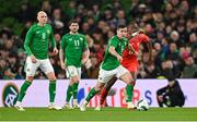 26 March 2024; Josh Cullen of Republic of Ireland with Will Smallbone, left, and Robbie Brady during the international friendly match between Republic of Ireland and Switzerland at the Aviva Stadium in Dublin. Photo by Stephen McCarthy/Sportsfile