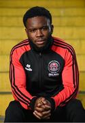 27 March 2024; James Akintunde sits for a portrait during a Bohemians media conference at Dalymount Park in Dublin. Photo by Seb Daly/Sportsfile