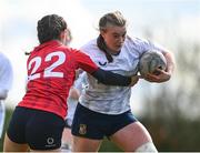 27 March 2024; Caoimhe McCormack of Midlands in action against Alysah Hollywood of North East during the BearingPoint Sarah Robinson Cup Round 5 match between Midlands and North East at Carlow Institute of Technology in Carlow. Photo by Tyler Miller/Sportsfile