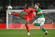 26 March 2024; Denis Zakaria of Switzerland and Nathan Collins of Republic of Ireland during the international friendly match between Republic of Ireland and Switzerland at the Aviva Stadium in Dublin. Photo by Ben McShane/Sportsfile