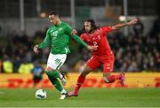26 March 2024; Adam Idah of Republic of Ireland and Kevin Mbabu of Switzerland during the international friendly match between Republic of Ireland and Switzerland at the Aviva Stadium in Dublin. Photo by Ben McShane/Sportsfile