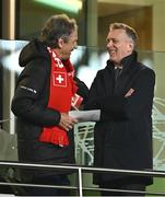 26 March 2024; FAI chief executive Jonathan Hill, right, and president of the Swiss Football Association Dominique Blanc before the international friendly match between Republic of Ireland and Switzerland at the Aviva Stadium in Dublin. Photo by Ben McShane/Sportsfile