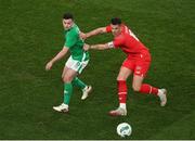 26 March 2024; Granit Xhaka of Switzerland in action against Josh Cullen of Republic of Ireland during the international friendly match between Republic of Ireland and Switzerland at the Aviva Stadium in Dublin.  Photo by Michael P Ryan/Sportsfile