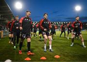 29 March 2024; Paddy Kirk of Bohemians, centre, and team mates warm up before the SSE Airtricity Men's Premier Division match between Shamrock Rovers and Bohemians at Tallaght Stadium in Dublin. Photo by David Fitzgerald/Sportsfile