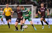 29 March 2024; Adam McDonnell of Bohemians in action against Gary O'Neill of Shamrock Rovers during the SSE Airtricity Men's Premier Division match between Shamrock Rovers and Bohemians at Tallaght Stadium in Dublin. Photo by Stephen McCarthy/Sportsfile