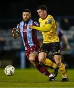 29 March 2024; Kian Leavy of St Patrick's Athletic in action against Gary Deegan of Drogheda United during the SSE Airtricity Men's Premier Division match between Drogheda United and St Patrick's Athletic at Weavers Park in Drogheda, Louth. Photo by Piaras Ó Mídheach/Sportsfile