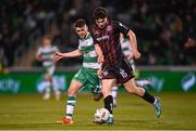 29 March 2024; James Clarke of Bohemians in action against Dylan Watts of Shamrock Rovers during the SSE Airtricity Men's Premier Division match between Shamrock Rovers and Bohemians at Tallaght Stadium in Dublin. Photo by David Fitzgerald/Sportsfile