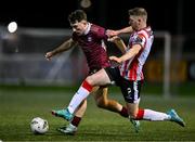 29 March 2024; Edward McCarthy of Galway United in action against Ronan Boyce of Derry City during the SSE Airtricity Men's Premier Division match between Derry City and Galway United at The Ryan McBride Brandywell Stadium in Derry. Photo by Ben McShane/Sportsfile