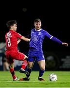 29 March 2024; Ryan Burke of Waterford in action against Niall Morahan of Sligo Rovers during the SSE Airtricity Men's Premier Division match between Waterford and Sligo Rovers at the Regional Sports Centre in Waterford. Photo by Michael P Ryan/Sportsfile