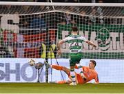 29 March 2024; Johnny Kenny of Shamrock Rovers shoots to score his side's first goal past Bohemians goalkeeper Kacper Chorazka during the SSE Airtricity Men's Premier Division match between Shamrock Rovers and Bohemians at Tallaght Stadium in Dublin. Photo by Stephen McCarthy/Sportsfile