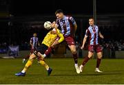 29 March 2024; Hayden Cann of Drogheda United in action against Ruairí Keating of St Patrick's Athletic during the SSE Airtricity Men's Premier Division match between Drogheda United and St Patrick's Athletic at Weavers Park in Drogheda, Louth. Photo by Piaras Ó Mídheach/Sportsfile