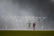 29 March 2024; Lee Grace of Shamrock Rovers in action against Jordan Flores of Bohemians during the SSE Airtricity Men's Premier Division match between Shamrock Rovers and Bohemians at Tallaght Stadium in Dublin. Photo by Stephen McCarthy/Sportsfile