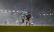 29 March 2024; Lee Grace of Shamrock Rovers in action against Jordan Flores of Bohemians during the SSE Airtricity Men's Premier Division match between Shamrock Rovers and Bohemians at Tallaght Stadium in Dublin. Photo by Stephen McCarthy/Sportsfile