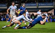 29 March 2024; Jack Conan of Leinster scores his side's sixth try, despite the tackle of Vodacom Bulls Devon Williams, during the United Rugby Championship match between Leinster and Vodacom Bulls at the RDS Arena in Dublin. Photo by Seb Daly/Sportsfile