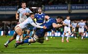 29 March 2024; Jack Conan of Leinster scores his side's sixth try, despite the tackle of Vodacom Bulls Devon Williams, during the United Rugby Championship match between Leinster and Vodacom Bulls at the RDS Arena in Dublin. Photo by Seb Daly/Sportsfile