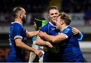 29 March 2024; Liam Turner of Leinster, right, celebrates with teammates Rob Russell, centre, and Jamison Gibson-Park after scoring their side's seventh try during the United Rugby Championship match between Leinster and Vodacom Bulls at the RDS Arena in Dublin. Photo by Seb Daly/Sportsfile