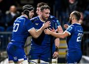 29 March 2024; Jack Conan of Leinster celebrates with teammates Caelan Doris and Jamison Gibson-Park after scoring his side's sixth try during the United Rugby Championship match between Leinster and Vodacom Bulls at the RDS Arena in Dublin. Photo by Harry Murphy/Sportsfile