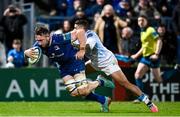 29 March 2024; Jack Conan of Leinster on his way to scoring his side's sixth try despite the tackle of Devon Williams of Vodacom Bulls during the United Rugby Championship match between Leinster and Vodacom Bulls at the RDS Arena in Dublin. Photo by Harry Murphy/Sportsfile
