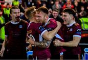 29 March 2024; Stephen Walsh of Galway United, second from right, celebrates with teammates, from left, David Hurley, Conor McCormack, and Edward McCarthy after scoring their side's first goal during the SSE Airtricity Men's Premier Division match between Derry City and Galway United at The Ryan McBride Brandywell Stadium in Derry. Photo by Ben McShane/Sportsfile
