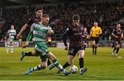 29 March 2024; Darragh Nugent of Shamrock Rovers in action against Paddy Kirk of Bohemians during the SSE Airtricity Men's Premier Division match between Shamrock Rovers and Bohemians at Tallaght Stadium in Dublin. Photo by David Fitzgerald/Sportsfile
