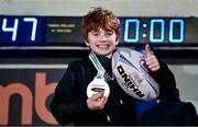 29 March 2024; Leinster supporter Aodh Whelan with the Player of the Match medal, gifted to him by Jack Conan of Leinster, after the United Rugby Championship match between Leinster and Vodacom Bulls at the RDS Arena in Dublin. Photo by Seb Daly/Sportsfile