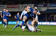 29 March 2024; Jack Conan of Leinster evades the tackle of Willie Le Roux of Vodacom Bulls on his way to scoring his side's sixth try during the United Rugby Championship match between Leinster and Vodacom Bulls at the RDS Arena in Dublin. Photo by Seb Daly/Sportsfile