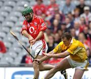 25 July 2004; Jerry O'Connor, Cork, is tackled by Antrim's Kieran Kelly. Guinness All-Ireland Senior Hurling Championship, Quarter Final, Antrim v Cork, Croke Park, Dublin. Picture credit; Brian Lawless / SPORTSFILE