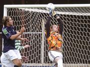 25 July 2004; Stephen Grant, left, Shamrock Rovers, beats Carrick United goalkeeper Adrian Walsh to score his sides second goal. FAI Carlsberg Cup, Second Round, Shamrock Rovers v Carrick United, Richmond Park, Dublin. Picture credit; David Maher / SPORTSFILE