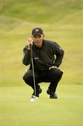 25 July 2004; Padraig Harrington lines up his putt on the 3rd green during the fourth round. Nissan Irish Open Golf Championship, County Louth Golf Club, Baltray, Co. Louth. Picture credit; Matt Browne / SPORTSFILE