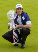 25 July 2004; Brett Rumford with the trophy after his victory. Nissan Irish Open Golf Championship, County Louth Golf Club, Baltray, Co. Louth. Picture credit; Matt Browne / SPORTSFILE