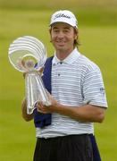25 July 2004; Brett Rumford with the trophy after his victory. Nissan Irish Open Golf Championship, County Louth Golf Club, Baltray, Co. Louth. Picture credit; Matt Browne / SPORTSFILE