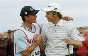 25 July 2004; Brett Rumford is congratulated by his caddy Michael Cross after his victory. Nissan Irish Open Golf Championship, County Louth Golf Club, Baltray, Co. Louth. Picture credit; Matt Browne / SPORTSFILE
