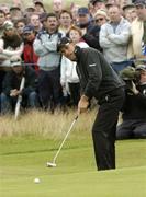 25 July 2004; Padraig Harrington watches his putt on the 18th green during the fourth round. Nissan Irish Open Golf Championship, County Louth Golf Club, Baltray, Co. Louth. Picture credit; Matt Browne / SPORTSFILE