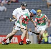 24 July 2004; Stephen Coyne, Mayo, is tackled by Kildare's John Brennan. All-Ireland Senior B Hurling Final, Kildare v Mayo, Croke Park, Dublin. Picture credit; Ray McManus / SPORTSFILE