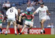 24 July 2004; Stephen Coyne, Mayo, is tackled by Kildare's John Brennan and David Harvey, 6. All-Ireland Senior B Hurling Final, Kildare v Mayo, Croke Park, Dublin. Picture credit; Ray McManus / SPORTSFILE