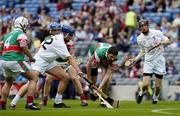 24 July 2004; Paddy Barrett, Mayo, is tackled by Kildare's Billy White. All-Ireland Senior B Hurling Final, Kildare v Mayo, Croke Park, Dublin. Picture credit; Ray McManus / SPORTSFILE