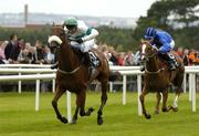 26 July 2004; Rockstown Boy, with John McNamara up, races clear of Le Leopard, Nina Carberry up, right, on their way to winning the G.P.T Galway (Q.R.) Handicap. Galway Racing Festival, Ballybrit, Galway. Picture credit; Pat Murphy / SPORTSFILE