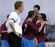 26 July 2004; John Lester, far right, Drogheda United, celebrates after scoring his sides second goal with team-mates, Gavin Whelan, no.7 and Barry Molloy, as Dundalk's Stephen McGuinness watches on. FAI Carlsberg Cup, Second Round Replay, Drogheda United v Dundalk, United Park, Drogheda, Co. Louth. Picture credit; David Maher / SPORTSFILE