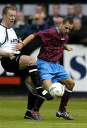 26 July 2004; Declan O'Brien, Drogheda United, in action against Stephen McGuinness, Dundalk. FAI Carlsberg Cup, Second Round Replay, Drogheda United v Dundalk, United Park, Drogheda, Co. Louth. Picture credit; David Maher / SPORTSFILE